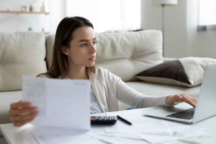 A real estate investor reviewing her portfolio.