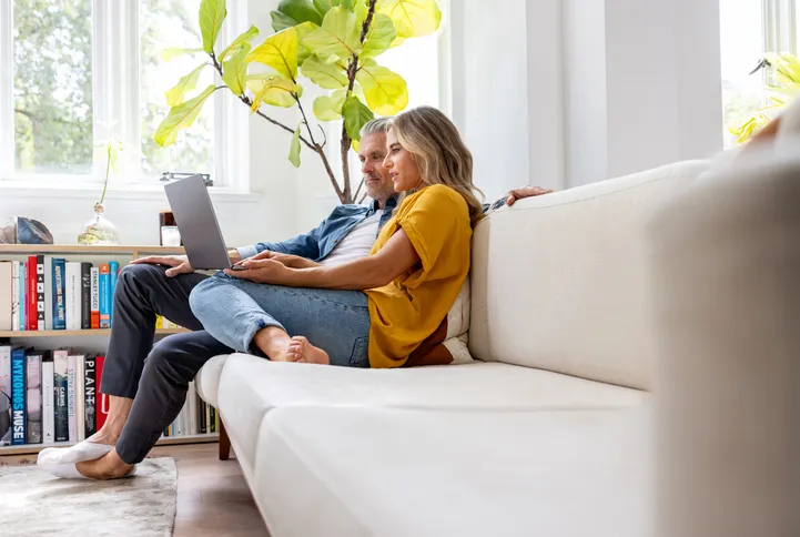 A couple reviewing their mortgage application.