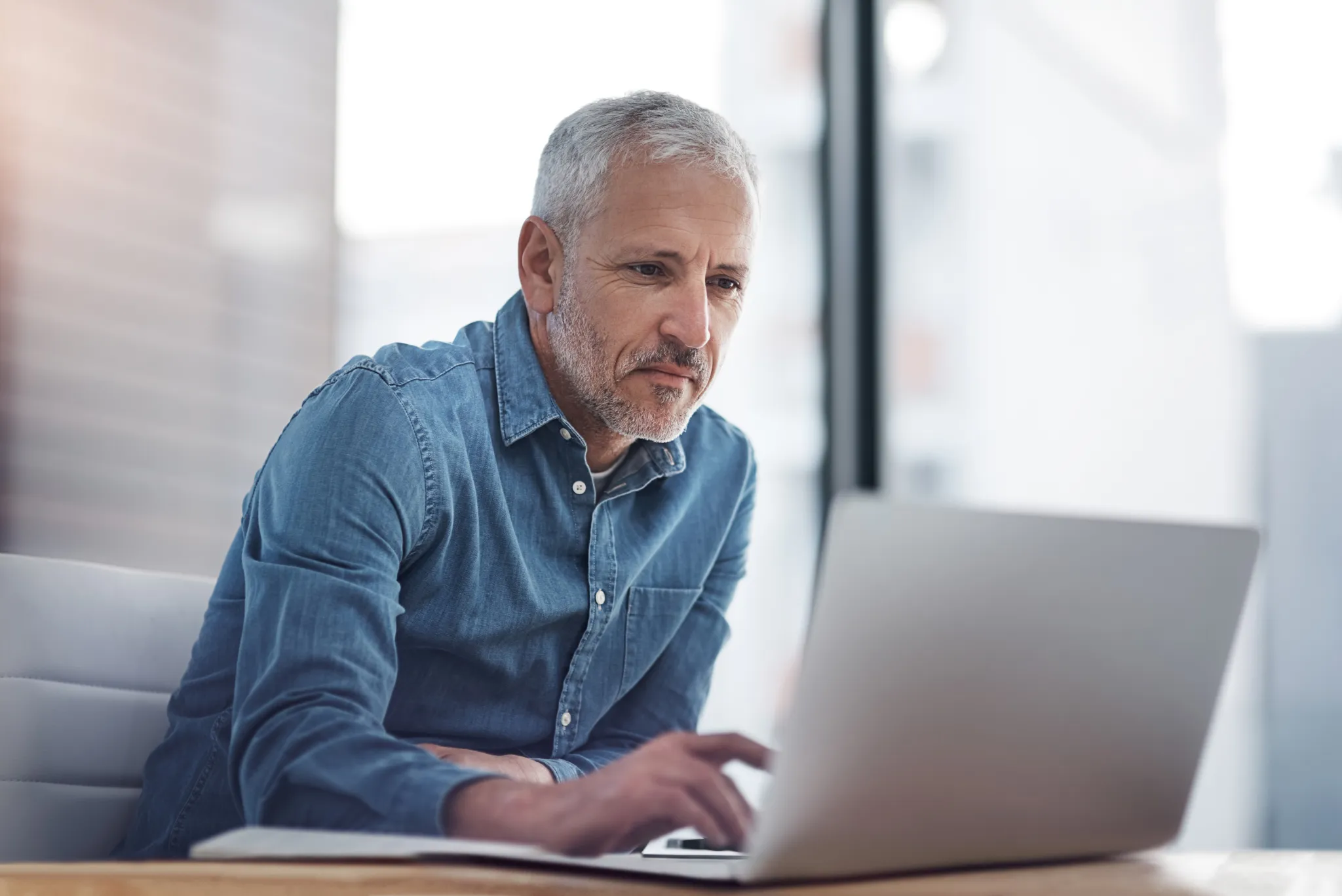 An investor researching how the windfall tax could affect investments.