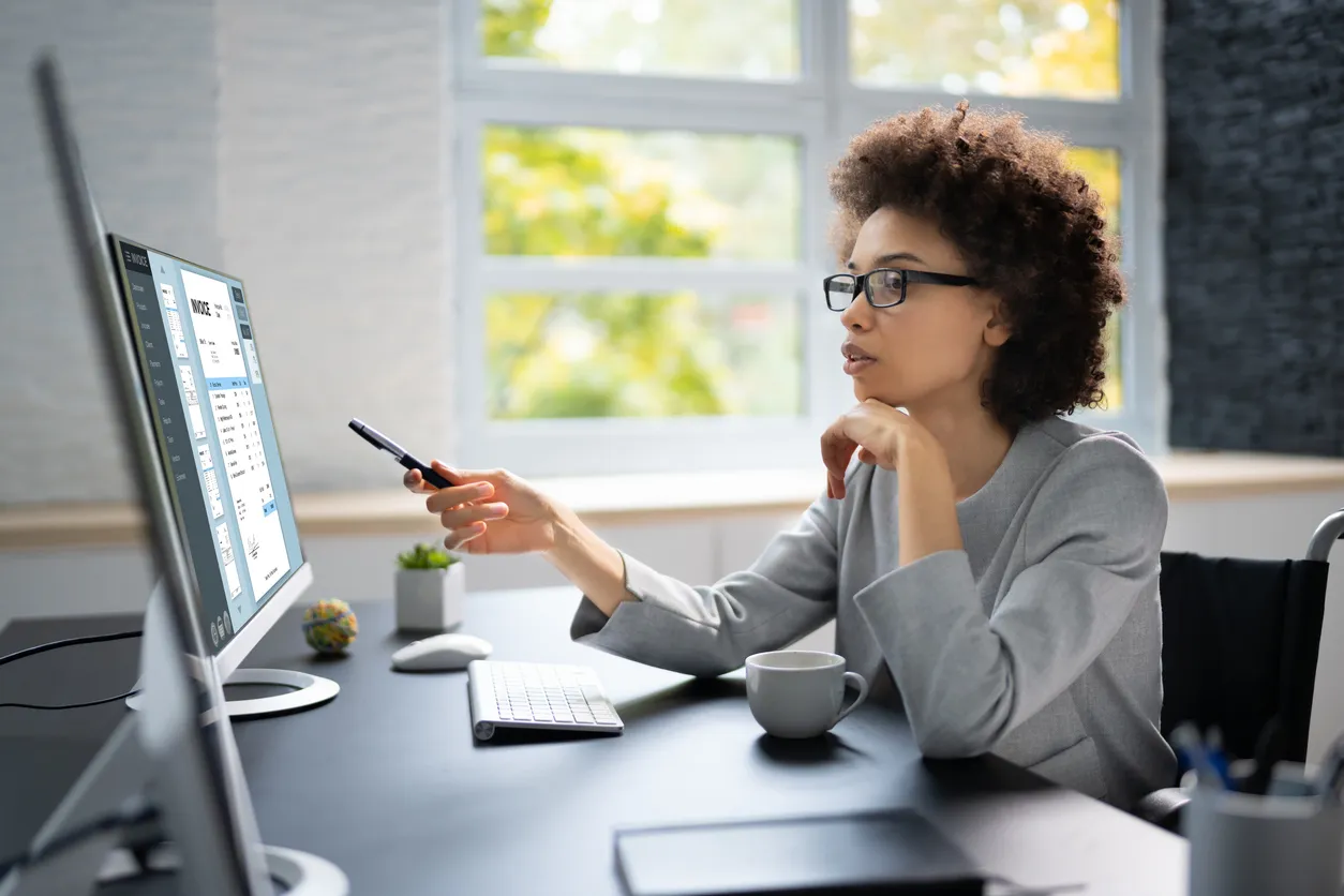 A financial advisor reviews the portfolio of a client.