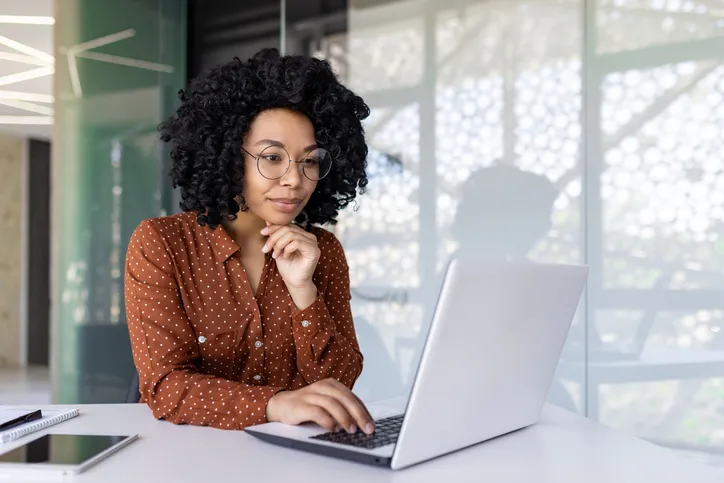 A woman reviewing a small business plan.