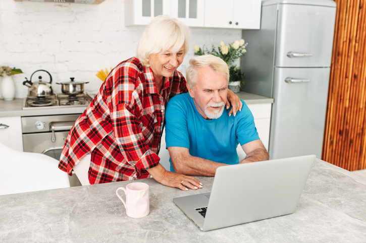 A senior couple reviewing their estate plan.