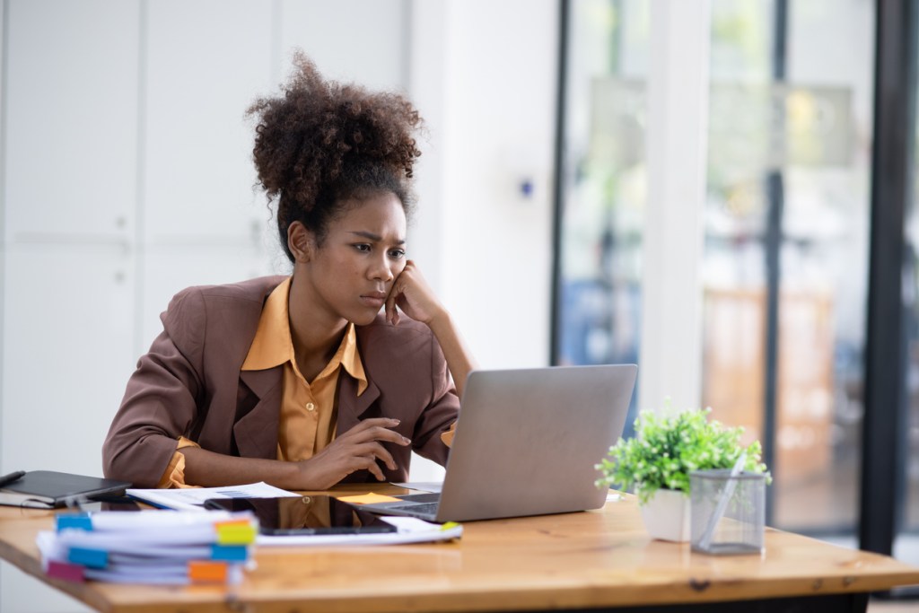 An investor reviewing the performance of her portfolio.