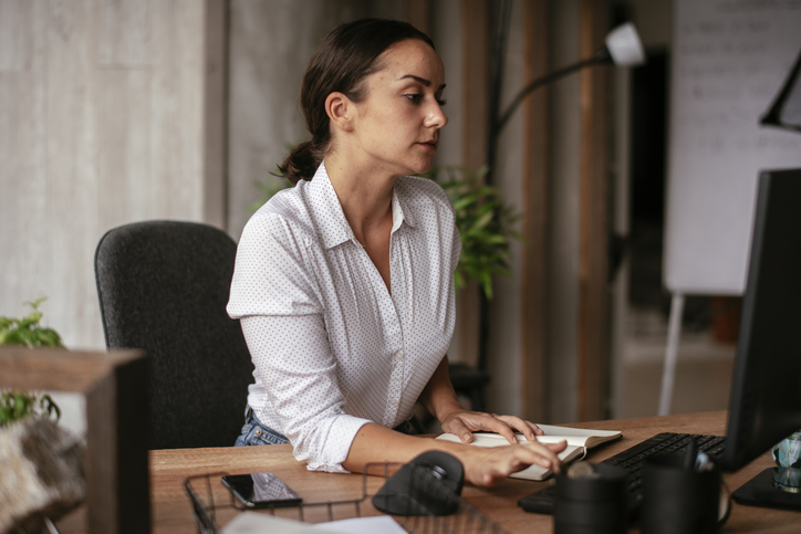 An investor reviewing her investment portfolio.