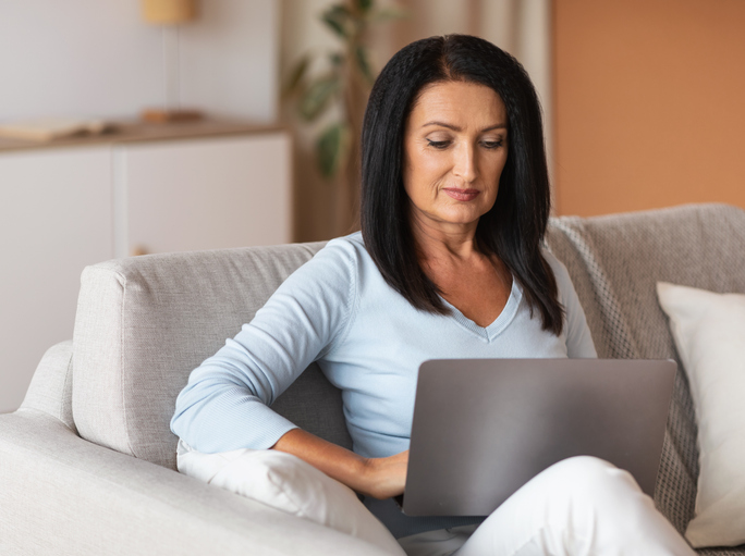 A woman reviews her investment portfolio.