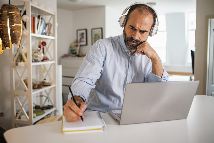 An investor calculating the overhead ratio of a company.