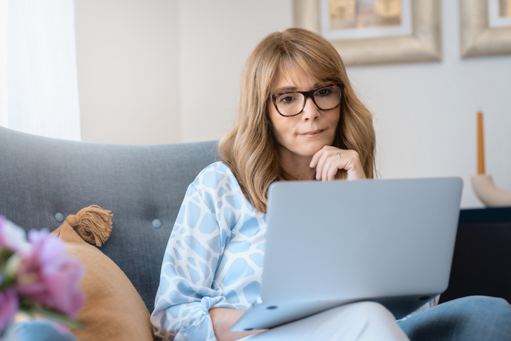 A woman making contributions to her retirement plan.