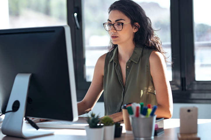 An investor reviewing her investment portfolio.