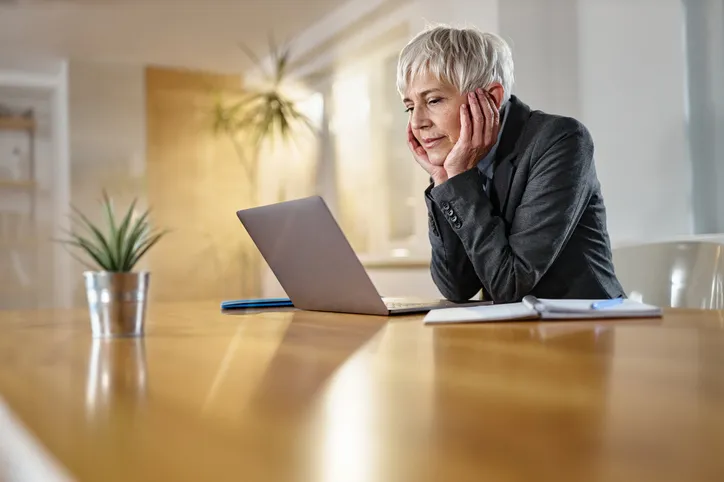 A woman reviewing her retirement plan.