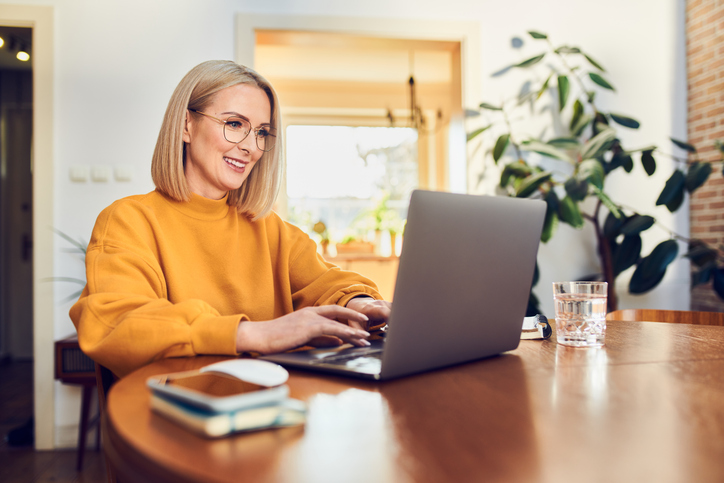 A woman rebalances her portfolio after a market change.