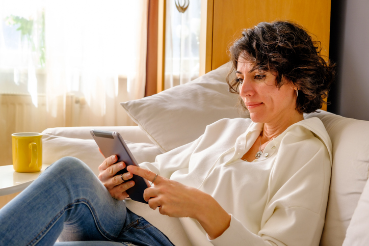 A woman looking up how to maximize her retirement benefits.