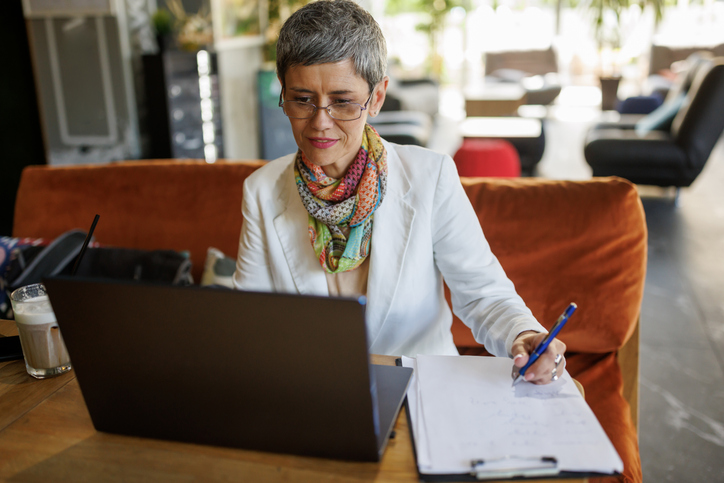 A client reviewing an investment plan that was created by her financial advisor. 