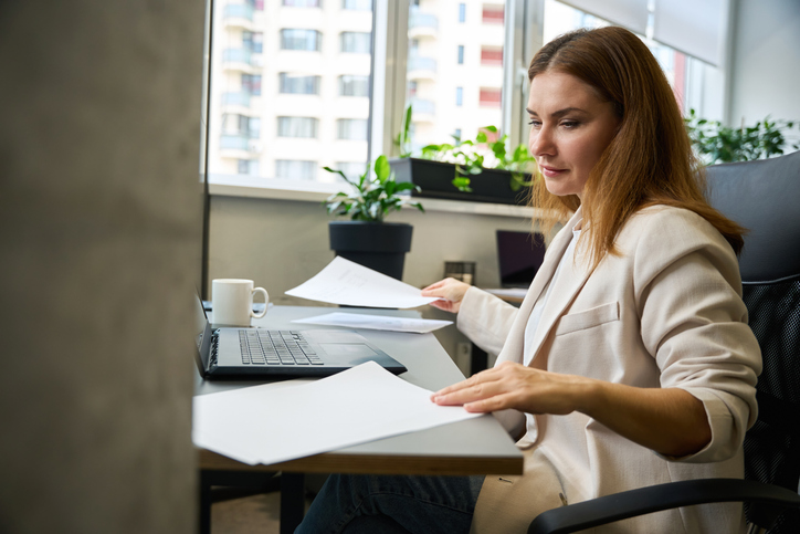 An investor reviewing her investment portfolio.