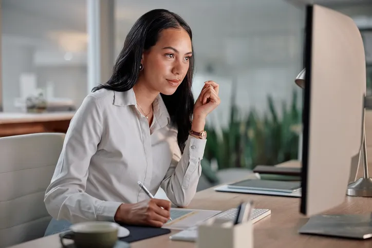 A woman reviews her financial plan.