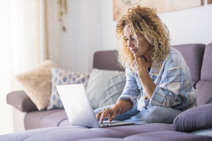 A woman reviews her investment portfolio.