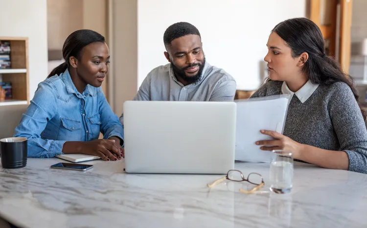 Business partners discussing a small business plan.