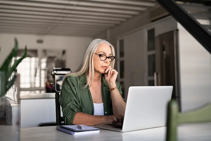 A woman reviewing her retirement plan.