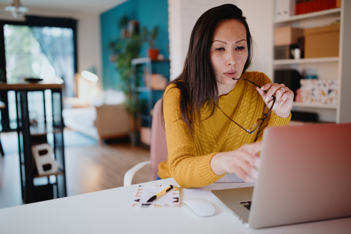 A woman reviewing a tax strategy for her portfolio.