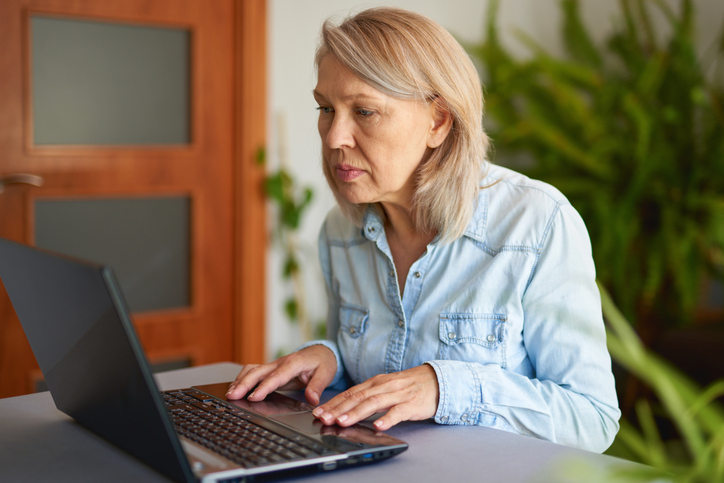A woman comparing the pros and cons of using a discretionary account.