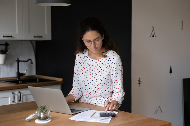 An investor reviewing her investment portfolio.