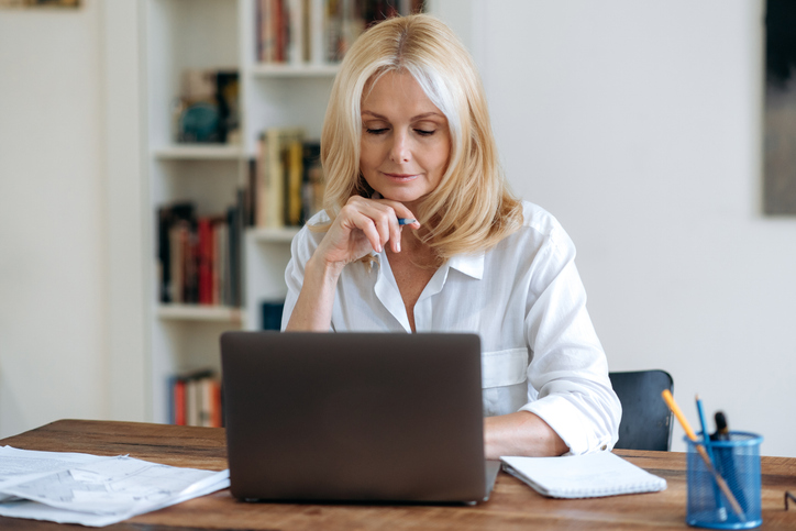 A woman reviewing her retirement plan.