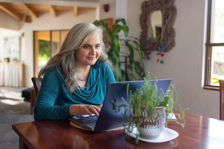 A woman reviewing her retirement portfolio.