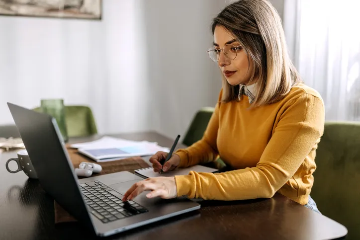 A woman researching when tenancy by the entirety can be canceled.