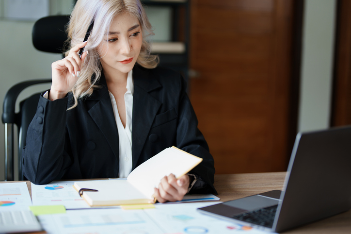 An investor reviewing her real estate portfolio.