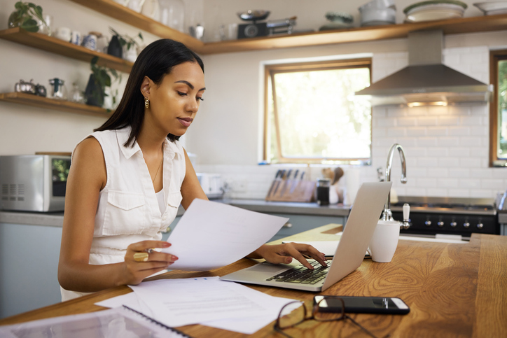 An investor reviews her investment portfolio.