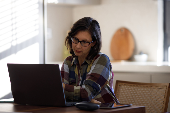 A woman making changes to her estate plan.
