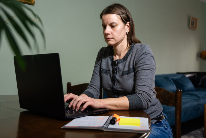 An investor reviewing her investment portfolio.