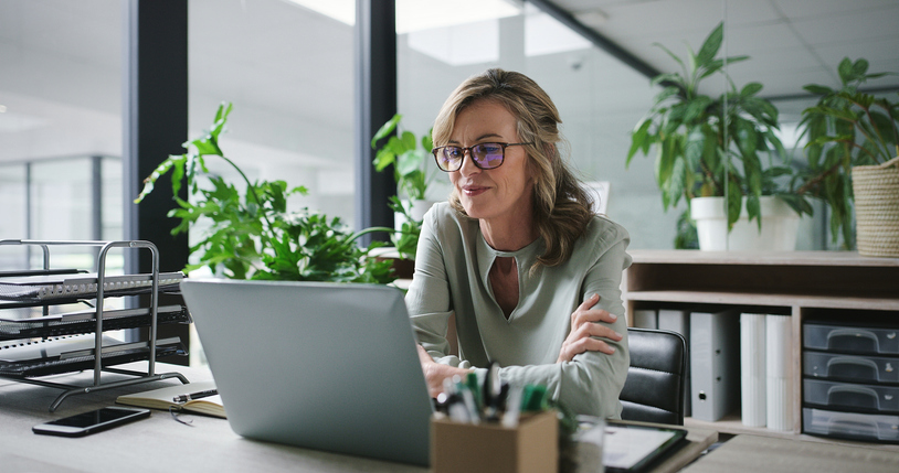 A business owner reviewing the cash flow of her business.