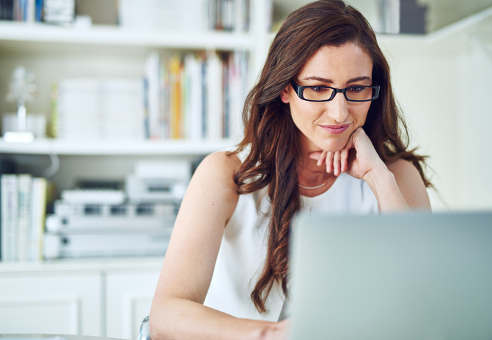 A woman filing her taxes online in Alaska.