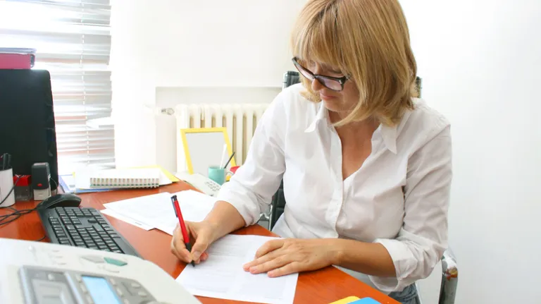 An investor preparing tax documents for her portfolio.