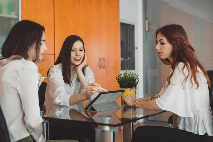 A financial advisor explaining different types of stop loss orders to clients.