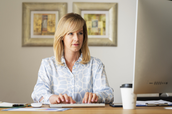 An investor reviewing her investment portfolio.