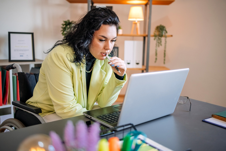A woman reviewing her retirement plan goals.