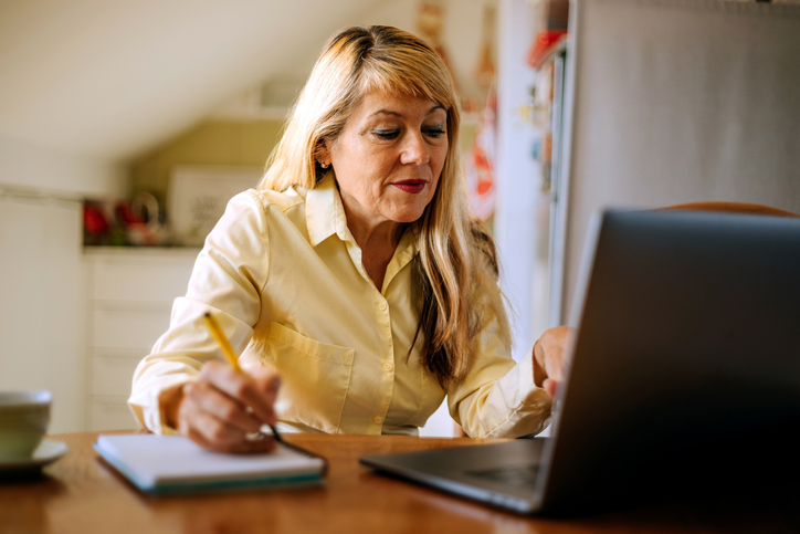 A real estate investor looks up different ways to find lien sales.