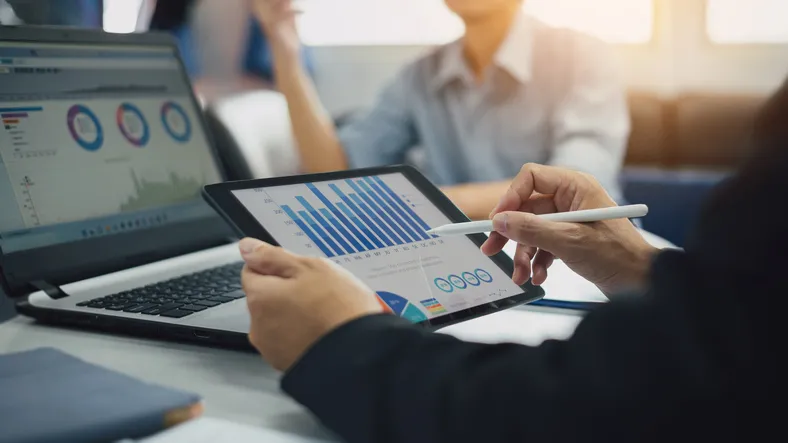 An advisor showing a client their portfolio.