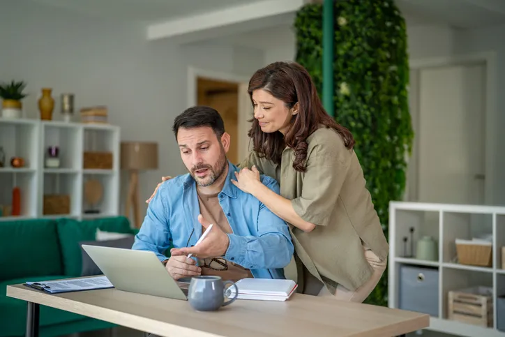 Couple discussing their financial situation.