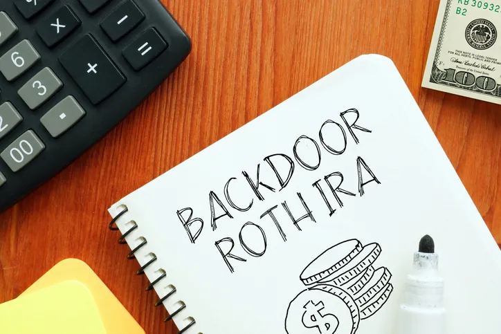 Backdoor Roth IRA written in a notebook.