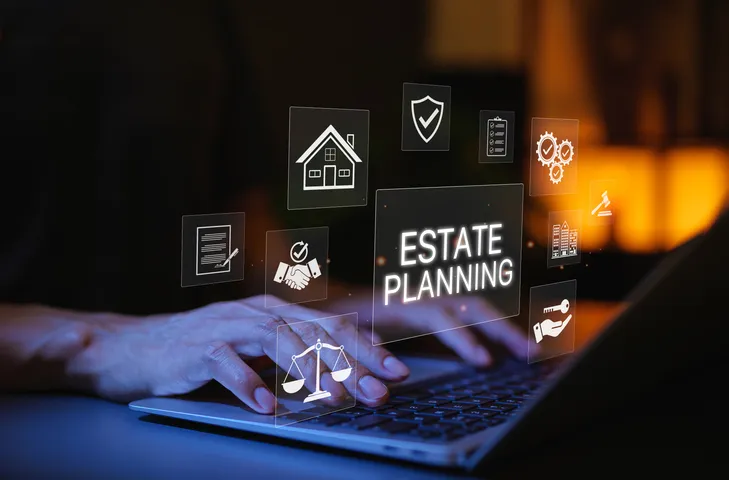 A person researching estate planning on their laptop.