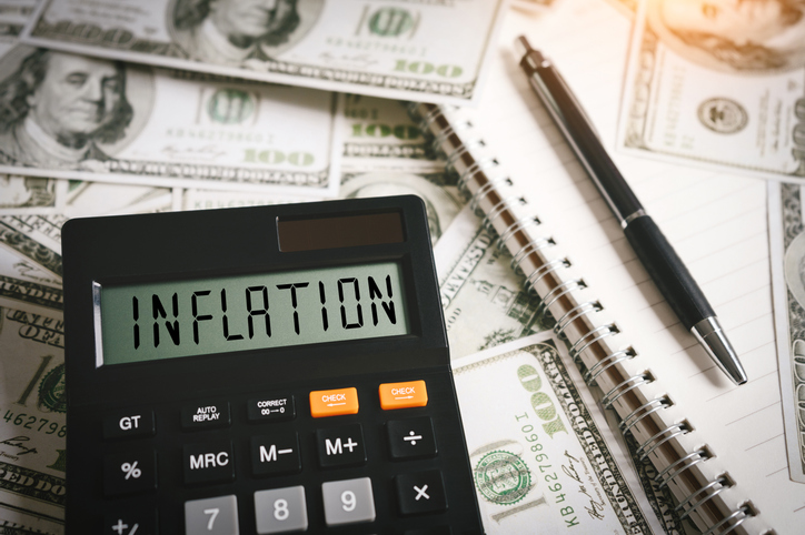 The word "inflation" on a calculator.