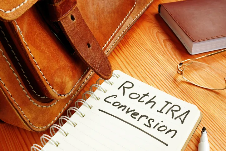 Roth IRA conversion memo and briefcase.