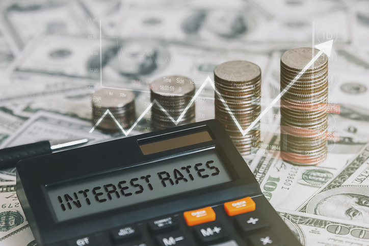 A calculator displaying the words "interest rates."