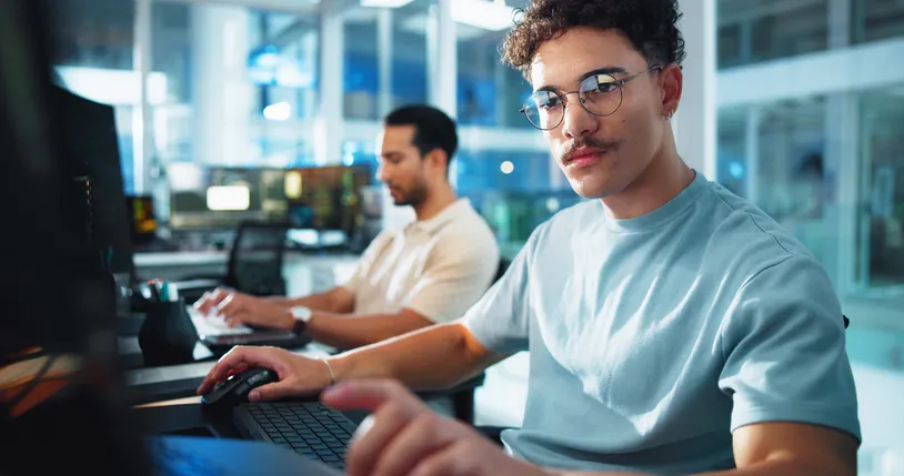 Computer programmer working on a project.