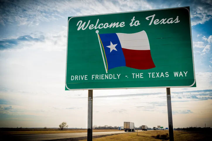 "Welcome to Texas" road sign.